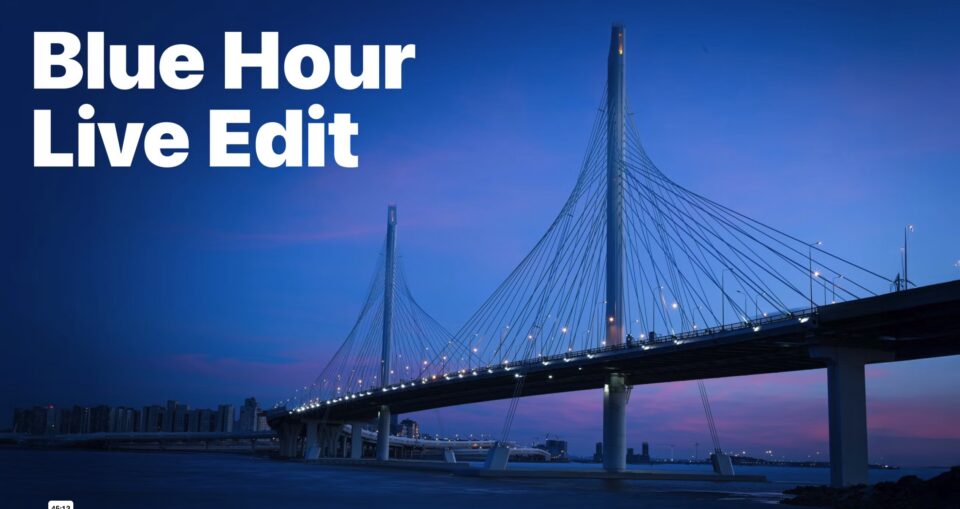 Blue hour urban bridge photograph with deep blue sky and city lights edited during ON1 Photo RAW Live Edit session