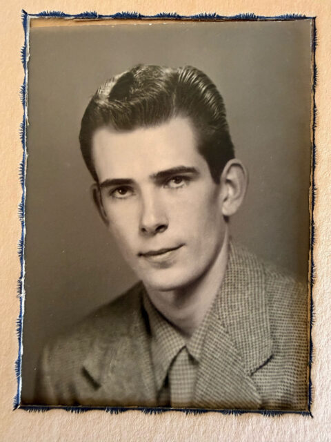 Original black-and-white portrait of a man from the early 1950s, showing a vintage studio-style photograph before AI restoration or colorization.