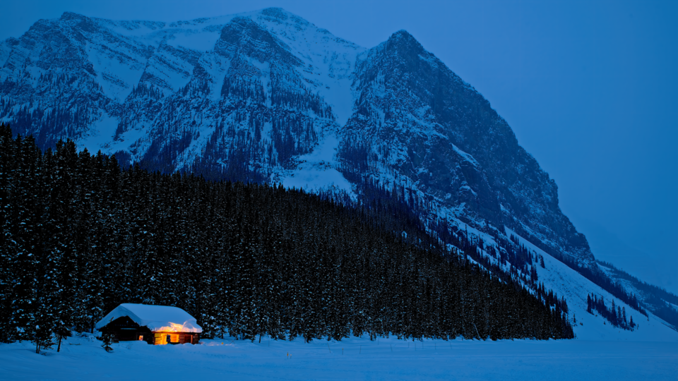 The famous boathouse at Lake Louise sits still beside a frozen, snow-covered lake on a cold March evening, with Fairview Mountain rising in the background. Edited in ON1 Photo RAW 2026 using Brilliance AI, the ON1 Vivid tone profile, Color Enhancer, and Tone Enhancer — a strong result from a photographer who describes himself as new to advanced editing.