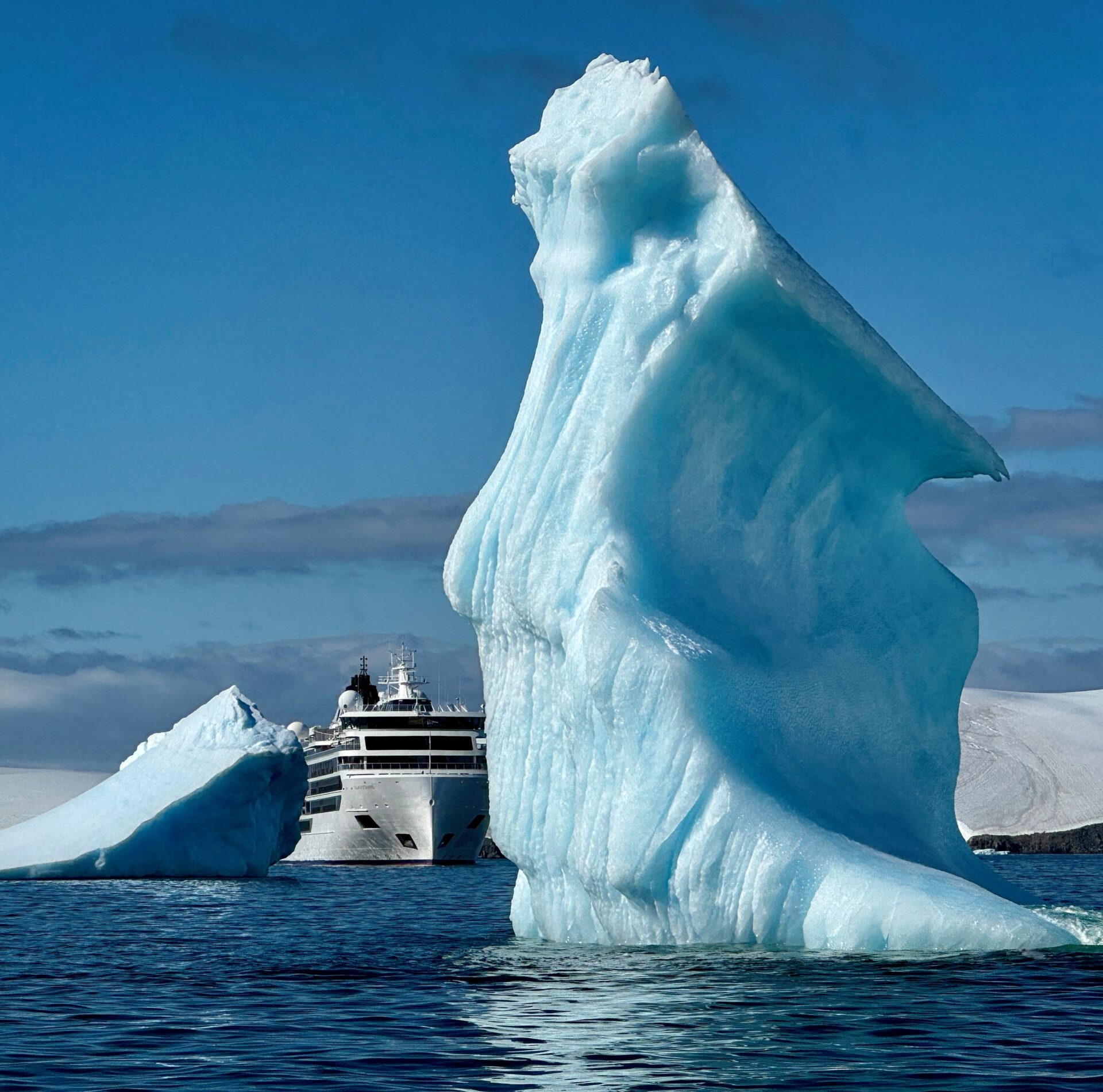 Our ship Behind Iceberg in Antarctica from Kayak