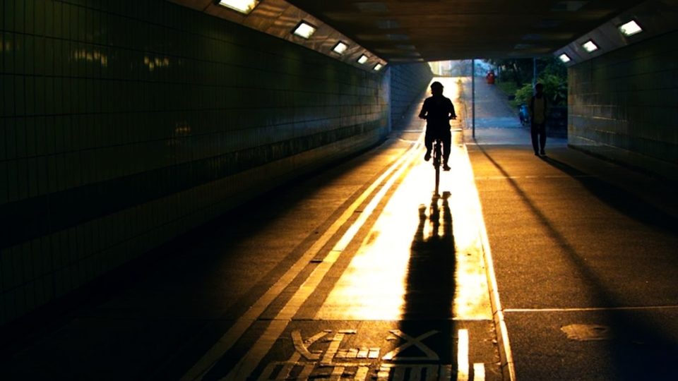 Same tunnel scene after the Urban Pop LUT, with deeper shadows and warmer golden light